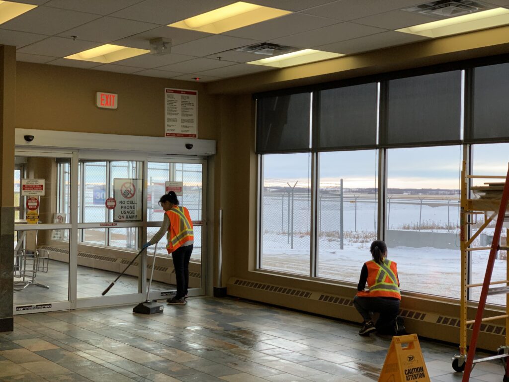 Women cleaning the floor