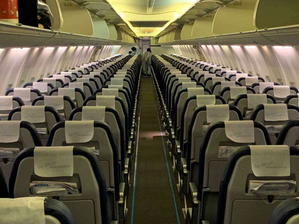 People cleaning the airplane