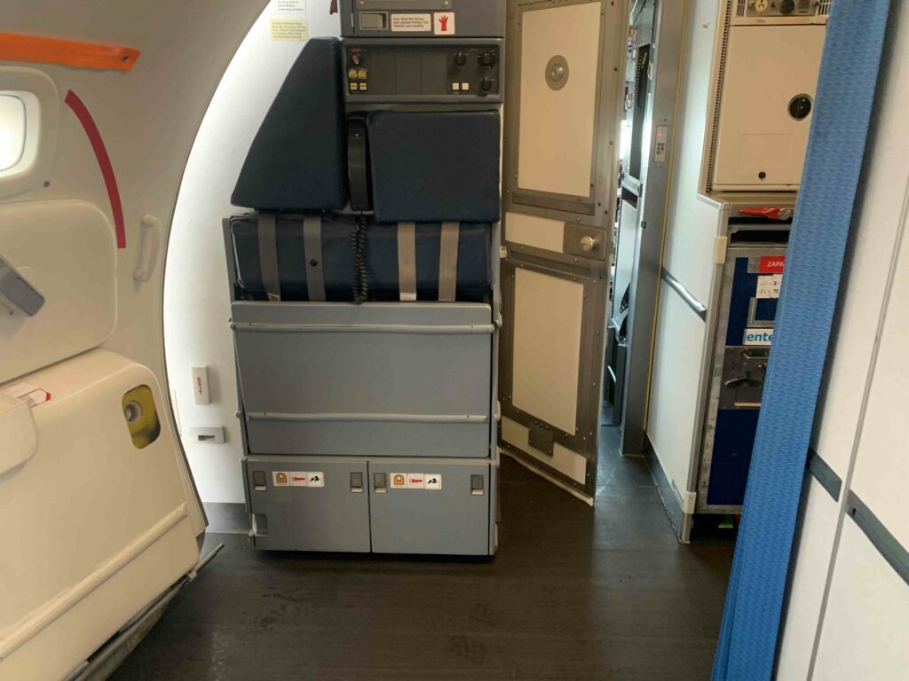 Airplane entrance door near the cockpit