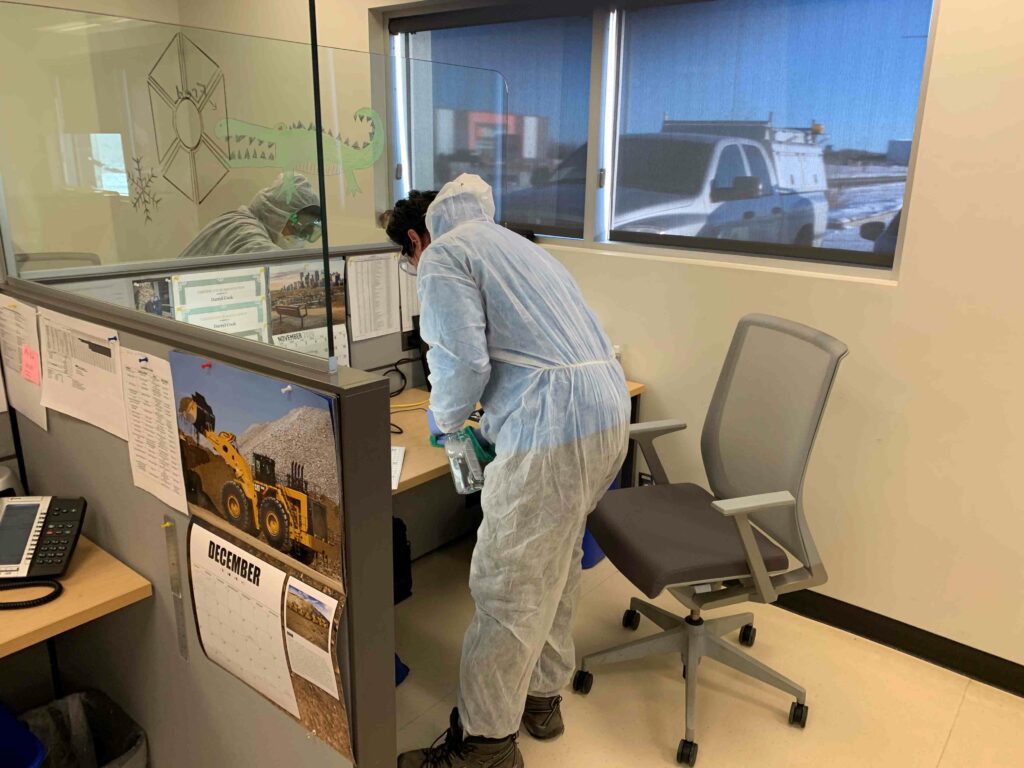 Men cleaning the office cubicles