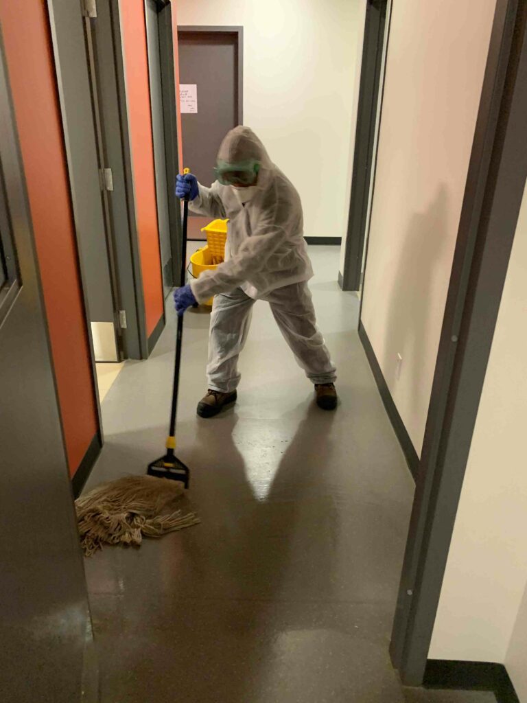 Man mopping the floor