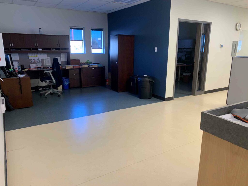 Office area with wood cabinets