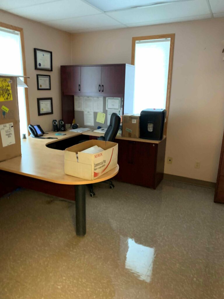 Cardboard box on top of a desk